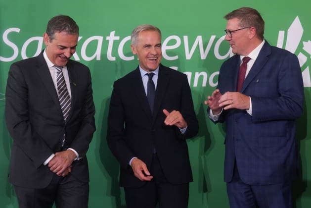 September 14, 2026, Toronto, On, Canada: Prime Minister Mark Carney, centre, laughs as he speaks with Bell Canada CEO Mirko Bibic, left, and Saskatchewan Premier Scott Moe at Canada s national investment summit, in Toronto, on Monday, Sept. 14, 2026. Toronto Canada - ZUMAc35_ 20260914_zaf_c35_078 Copyright: xNathanxDenettex