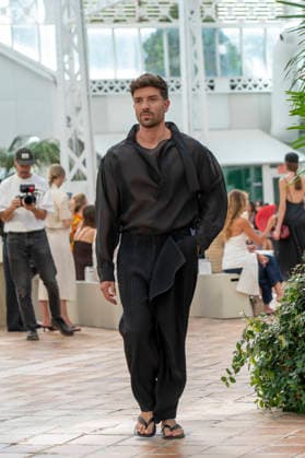 Singer Pablo Alboran walks the runway wearing a creation by Adolfo Dominguez during the presentation of the Croma collection for spring-summer 2027, part of Mercedes-Benz Fashion Week Madrid. The Malaga-born artist, who made an unexpected public reappearance after several weeks away from the stage due to pneumonia, became one of the highlights of the opening day by making a surprise appearance as a model in the Galician label s show. September 14,2026. (20260914990)