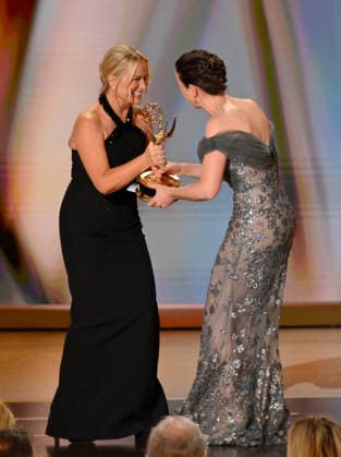 Amy Poehler presents the Emmy Award to Kate O Flynn, who won the Outstanding Supporting Actress in a Comedy Series Award for Widow s Bay onstage during the 78th annual Primetime Emmy Awards at the Peacock Theater in Los Angeles on Monday, September 14, 2026.  LAP2026091436 JIMxRUYMEN
