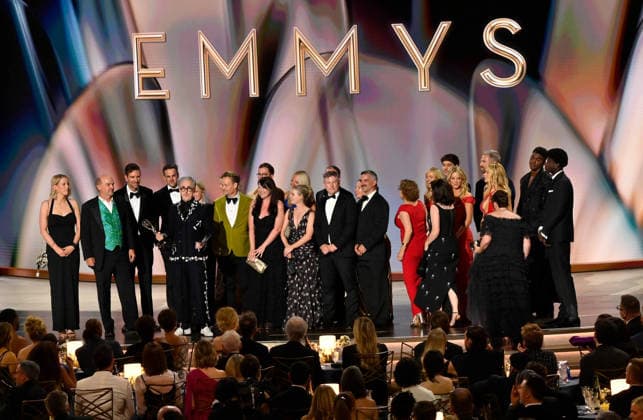 Cast and crew including Stephen Lambert, Mike Cotton, Sam Rees-Jones, Rosie Franks and Alan Cumming accept the Outstanding Reality Competition Program Award for The Traitors on stage during the 78th annual Primetime Emmy Awards at the Peacock Theater in Los Angeles on Monday, September 14, 2026.  LAP2026091492 JIMxRUYMEN