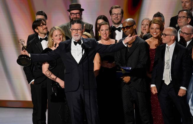 Cast and crew including Ariel Dumas, Opus Moreschi, Lauren Marcello, Sara Vilkomerson, Gabriel W Gronli, Stephen Colbert, Paul Dinello, Bjoern Stejskal, Tanya Michnevich Bracco, Matt Lappin, Michael R Brumm and Aaron Cohen accept the Outstanding Variety Series Award for The Late Show with Stephen Colbert on stage during the 78th annual Primetime Emmy Awards at the Peacock Theater in Los Angeles on Monday, September 14, 2026.  LAP20260914129 JIMxRUYMEN