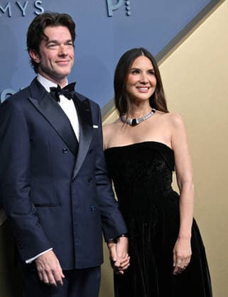 John Mulaney and Olivia Munn arrive for the 78th annual Primetime Emmy Awards at the Peacock Theater in Los Angeles on Monday, September 14, 2026.  LAP20260914633 CHRISxCHEW