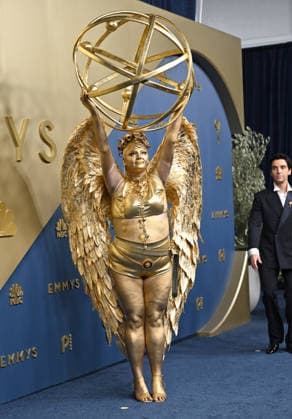 Megan Stalter and Paul W. Downs arrive for the 78th annual Primetime Emmy Awards at the Peacock Theater in Los Angeles on Monday, September 14, 2026.  LAP20260914652 CHRISxCHEW