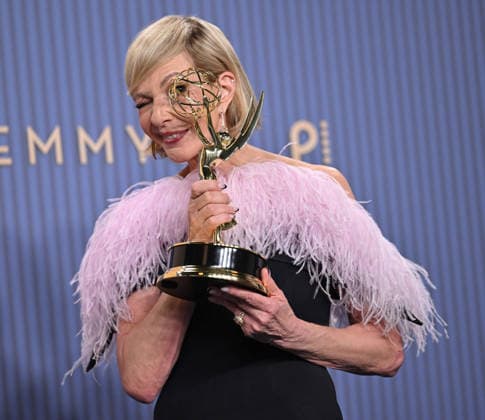 Allison Janney holds the Emmy for Outstanding Supporting Actress in a Drama Series for The Diplomat, backstage during the 78th annual Primetime Emmy Awards at the Peacock Theater in Los Angeles on Monday, September 14, 2026.  LAP20260914235 CHRISxCHEW