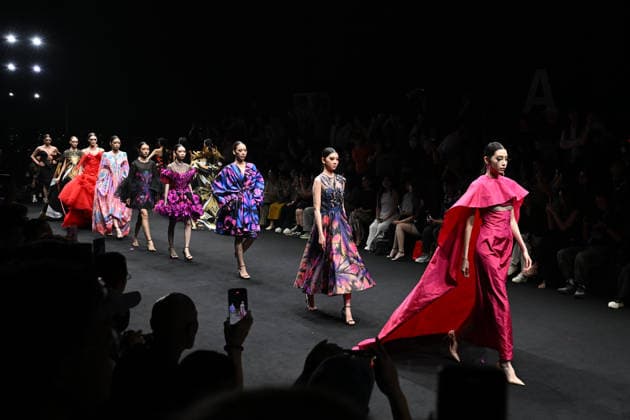 BEIJING, CHINA - SEPTEMBER 14: Models display fashion designs by Daniel IJ Uys and Claudine Uys during the SS2027 Beijing Fashion Week on September 14, 2026 in Beijing, China. The collection, themed Nocturnal Monarch Butterfly, draws inspiration from butterflies dancing in a garden after nightfall.  Copyright: xChinaxNewsxServicex 111666773925