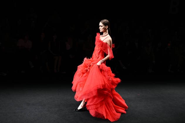 BEIJING, CHINA - SEPTEMBER 14: Models display fashion designs by Daniel IJ Uys and Claudine Uys during the SS2027 Beijing Fashion Week at Wangfujing on September 14, 2026 in Beijing, China. The season features the theme Nocturnal Monarch Butterfly, inspired by butterflies dancing in gardens after nightfall.  Copyright: xChinaxNewsxServicex 111666774110