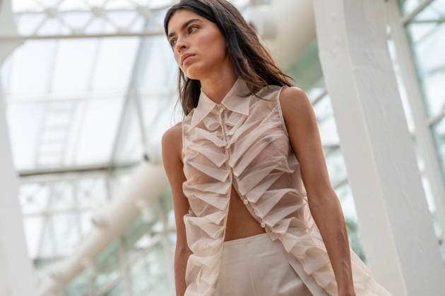 Model Lucia Rivera walks the runway wearing a creation by Simorra during the presentation of the FOLD IN collection for spring-summer 2027, part of Mercedes-Benz Fashion Week Madrid. Rivera, daughter of Blanca Romero and Cayetano Rivera, shared the runway with her mother, who returned to modelling after a five-year absence. September 14,2026. (202609141522)