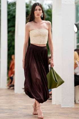 Models present creations from Simorra s FOLD IN collection for spring-summer 2027 during Mercedes-Benz Fashion Week Madrid. The Barcelona-based label, founded in 1978 by Javier Simorra, explores shapes, curves and the fold as a central element in this collection, with garments that adapt to the body and celebrate a beauty that resists rigidity. September 14,2026. (202609141604)