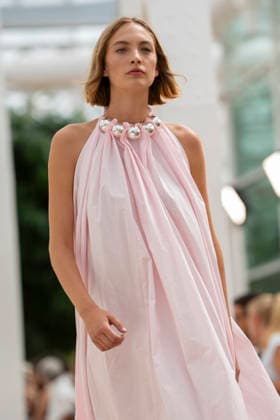Models present creations from Simorra s FOLD IN collection for spring-summer 2027 during Mercedes-Benz Fashion Week Madrid. The Barcelona-based label, founded in 1978 by Javier Simorra, explores shapes, curves and the fold as a central element in this collection, with garments that adapt to the body and celebrate a beauty that resists rigidity. September 14,2026. (202609141672)