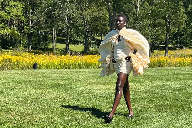 A model showcases a design by sustainable fashion brand Collina Strada in New York, United States, 15 September 2026. Collina Strada presented its new collection, featuring a punk and dreamy vibe, on a mountain in upstate New York, in the middle of a meadow surrounded by trees and dragonflies. Collina Strada presents her sustainable and punk fashion on a New York mountain !ACHTUNG: NUR REDAKTIONELLE NUTZUNG!  Copyright: xNoraxQuintanillax AME7670 20260915-55021409563_1