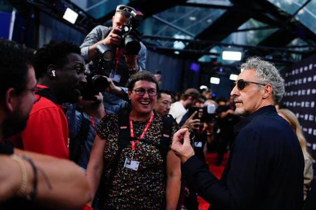 September 16, 2026, Toronto, On, CAN: John Turturro produces a set of keys he had taken out of a photographer s pocket as Giancarlo Esposito reacts on the red carpet to promote the film The Only Living Pickpocket in New York at the Toronto International Film Festival, in Toronto, on Wednesday Sept.16, 2026, Toronto CAN  - ZUMAc35_ 20260916_zaf_c35_163 Copyright: xChrisxYoungx