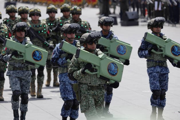 September 16, 2026, Mexico City, Mexico: Mexican President CLAUDIA SHEINBAUM PARDO led the Civic-Military Parade marking the 216th anniversary of the beginning of Mexicos Independence, which started at the Zocalo and traveled along Paseo de la Reforma to Campo Marte in Mexico City. The Armed Forces displayed military equipment and technology, including tactical drones and the Xolotl robot, designed to handle situations involving explosive devices. She was accompanied by Defense Secretary GENERAL RICARDO TREVILLA TREJO and Navy Secretary Admiral RAYMUNDO PEDRO MORALES ANGELES. Mexico City Mexico  - ZUMAl178 20260916_znp_l178_009 Copyright: xCristianxLeyvax