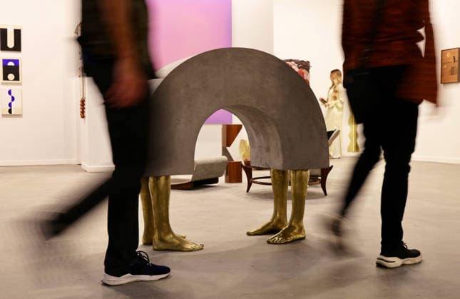 (260917) -- RIO DE JANEIRO, Sept. 17, 2026 -- Visitors pass by an art installation during the ArtRio 2026 in Rio de Janeiro, Brazil, Sept. 16, 2026. The five-day fair kicked off here on Wednesday, showcasing contemporary artworks such as paintings, sculptures and art installations from around the world. ) BRAZIL-RIO DE JANEIRO-ART FAIR-OPENING JinxHaoyuan 
