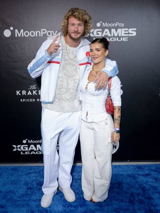 September 16, 2026, Los Angeles, California, USA: YUNG GRAVY and ARI KYTSYA attends the 2026 MoonPay X Games League Winter Draft blue carpet. Los Angeles USA  - ZUMAb173 20260916_aap_b173_011 Copyright: xBillyxBennightx