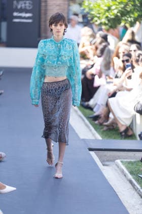 Custo Fashion Show at MBFW 2026 A model during the Custo Barcelona fashion show as part of Mercedes-Benz Fashion Week at Nebrija University on September 18, 2026, in Madrid, Spain. Custo presents its Spring Summer 2027 collection, titled Unexpected. The Catalan designer conceives this collection as an emotional manifesto to combat routine in the way we dress. SEPTEMBER 18, 2026, Madrid, Spain  Copyright: xEduardoxParrax 7783770