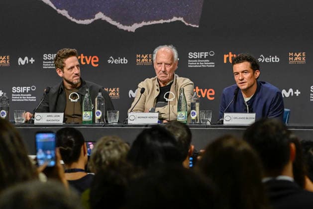 Werner Herzog Receives the Donostia Award at the San Sebastián Film Festival Director, screenwriter, producer, and actor Werner Herzog (c), accompanied by producer Ariel Leon Isacovitch (I) and actor Orlando Bloom (d), speaks with the media before receiving the Donostia Award, at the Kursaal on September 18, 2026, in San Sebastián, Guipúzcoa, Basque Country, Spain. Director, screenwriter, producer, and actor Werner Herzog will receive the Donostia Award in recognition of his career during the opening gala of the San Sebastián Film Festival, which will take place September 18–26 for its 74th edition. The Festival’s highest honorary distinction for the German filmmaker will be accompanied by a screening of his new feature film, ‘Bucking Fast Copyright: xArnaitzxRubiox 7783868