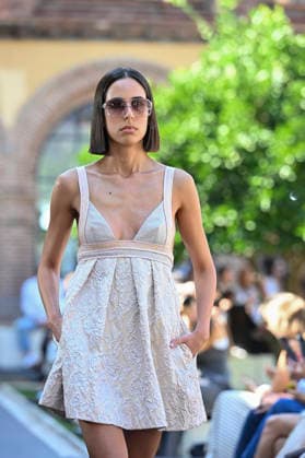 Custo Barcelona - Mercedes Benz Fashion Week Madrid, Spain - 18 Sept 2026 A model parades with Custo Barcelona design during Mercedes Benz Fashion Week Madrid Cibeles Palace in Madrid. Madrid Spain Copyright: xAtilanoxGarciax xSOPAxImagesx PHOTO08517
