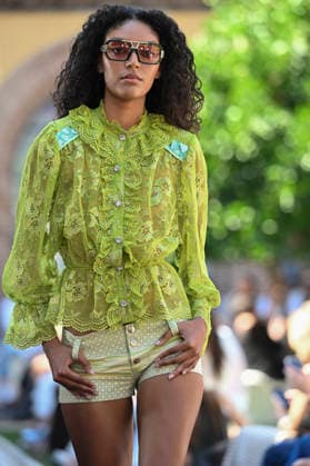 Custo Barcelona - Mercedes Benz Fashion Week Madrid, Spain - 18 Sept 2026 A model parades with Custo Barcelona design during Mercedes Benz Fashion Week Madrid Cibeles Palace in Madrid. Madrid Spain Copyright: xAtilanoxGarciax xSOPAxImagesx PHOTO08539