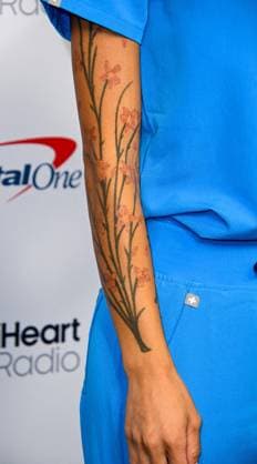 iHeartRadio Music Festival, night 1 Arrivals for the iHeartRadio Music Festival, night 1 at T-Mobile arena. 18 Sep 2026 Pictured: Lulu Tang, tattoo detail.  Copyright: xThexMegaxAgencyxMBS MEGAx