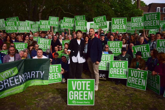 September 19, 2026, London, England, United Kingdom: Green Party leader ZACK POLANSKI and former leader CAROLINE LUCAS stand with supporters in Brunswick Square Gardens on the Big Saturday Out day of campaigning. Zack Polanski is the party s candidate for the Holborn and St Pancras by-election taking place in October. London United Kingdom - ZUMAv130 20260919_zip_v130_011 Copyright: xVukxValcicx