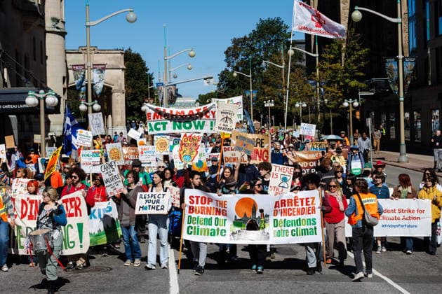 September 19, 2026, Ottawa, On, Canada: Demonstrators hold signs as they walk during a climate march in Ottawa, on Saturday, Sept. 19, 2026. Ottawa Canada  - ZUMAc35_ 20260919_zaf_c35_017 Copyright: xKeitoxNewmanx