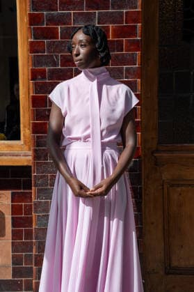September 20, 2026, London, Camden, United Kingdom: An attendee arrives wearing a pink dress at the Erdem catwalk show, held at the Roundhouse in Camden, London, as part of London Fashion Week 2026. Models and members of the fashion industry gather at the Roundhouse in Camden, London, for the Erdem catwalk show during London Fashion Week 2026. The event forms part of the official London Fashion Week schedule, bringing together models, designers, fashion professionals, media and guests for the presentation of Erdem s latest collection. London United Kingdom - ZUMAs197 20260920_aaa_s197_359 Copyright: xJamesxWilloughbyx