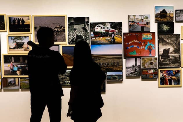 September 20, 2026, Surabaya, East Java, Indonesia: Visitors observe contemporary artworks at the ArtSubs 2026 exhibition at Balai Pemuda, Surabaya, East Java, Indonesia, on September 20, 2026. Titled border, threshold, beyond, the art exhibition features 500 works by 113 artists from across Indonesia, serving as a response to the public s need for a space of contemplation, reflection, and entertainment. Surabaya Indonesia - ZUMAp290 20260920_zip_p290_030 Copyright: xRendyxAgungxPrakosox