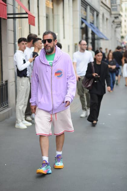 RECORD DATE NOT STATED IPA88808763 - Milan, photo by Mimmo Carriero—After stopping by Bacaro, a restaurant on Via Montenapoleone, Adam Sandler strolls through the streets of downtown. He is recognized immediately, and people ask him for photos and autographs, which he grants without hesitation. His wife Jackie follows him at a distance so as not to be recognized or photographed, and after entering the hotel—thinking no one is watching—they let themselves go, kissing and embracing before heading up to their room.  Copyright: xx xx IPA88808763