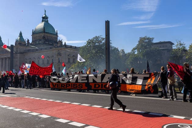 September 26, 2026, Leipzig, Saxony, Germany: Demonstrators participate in an UnkoÂ¼rzbar rally in Leipzig, Germany, on September 26, 2026, protesting cuts to social services and criticizing government spending priorities. Among the signs displayed during the demonstration were messages opposing increased investment in the arms industry and criticizing the Covenant military technology project in Leipzig. Protesters carried banners and placards calling for greater investment in social services and addressing issues including public spending, employment, pensions, healthcare and military expenditure. The demonstration took place in central Leipzig as part of the wider UnkoÂ¼rzbar campaign against cuts to social services. Leipzig Germany  - ZUMAc291 20260926_zip_c291_012 Copyright: xMariaxCastrox