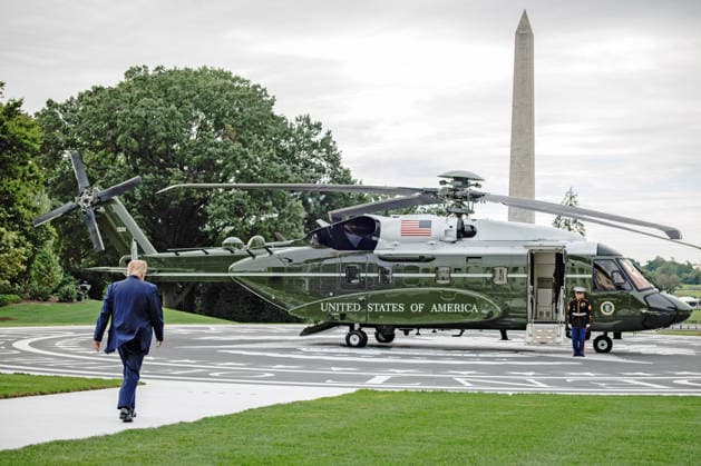 United States President Donald Trump walks over to the new Marine One, a Sikorsky VH-92A Patriot, on the new South Lawn helipad at the White House on September 26, 2026 in Washington, D.C. Trump is heading to Knoxville, Tennessee where he will be attending the University of Tennessee vs. University of Texas College Football game. Copyright: xSamuelxCorumx xPoolxviaxCNPx MediaPunchx