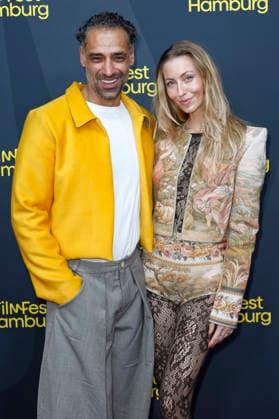 Tamer Trasoglu mit Ehefrau Estelle Adeline Trasoglu bei der Premiere der ARD-Serie Breitscheidplatz 19 12 auf dem 34. Filmfest Hamburg 2026 im Cinemaxx Dammtor. Hamburg, 26.09.2026