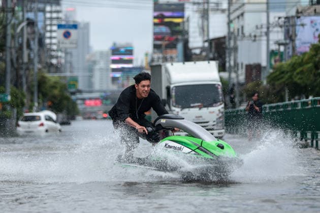 September 27, 2026, Bangkok, Bangkok, Thailand: A man rides a jet ski along a flooded Phetchaburi Road after 48 hours of continuous torrential rain caused widespread flash flooding across Bangkok, Thailand, September 27, 2026. Bangkok Thailand  - ZUMAp219 20260927_zip_p219_024 Copyright: xNattaphonxPhanphongsanonx