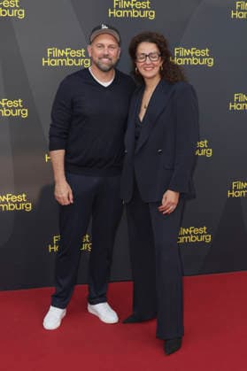 Steven Gätjen und Malika Rabahallah bei der Premiere des Kinofilms Wild Horse Nine auf dem 34. Filmfest Hamburg 2026 im Cinemaxx Dammtor. Hamburg, 27.09.2029