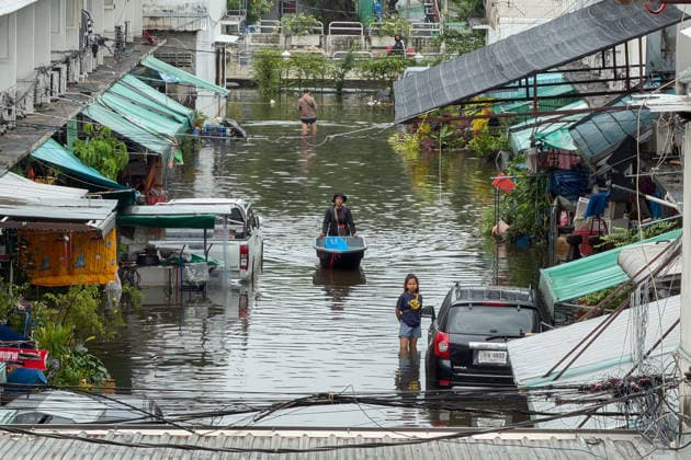 September 28, 2026, Bangkok, Bangkok, Thailand: A resident was wading through kneel-level water with a small boat in Bangkapi, one of the most flooded areas in Bangkok since an active low-pressure system and monsoon have dumped nearly 300 millimetres (11.8 inches) of rain since the afternoon of September 24. Bangkok authorities have officially declared all 50 districts of the Thai capital as flood disaster areas following four straight days of severe rainfall. Bangkok Thailand  - ZUMAw151 20260928_zip_w151_005 Copyright: xPatrickxChengzhixWangx