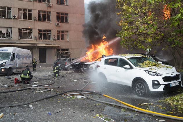 Rescuers pour water on burning cars and the National Academy of Sciences building, which is engulfed in flames after being hit by a Russian drone, Kyiv, Ukraine, September 28, 2026. One person was killed, and three others were injured in the attack.(Photo by Kyrylo Chubotin Ukrinform) Russian drone strikes Ukrainian National Academy of Sciences building in KyivRussian drone strikes Ukrainian National Academy of Sciences building in Kyiv  Copyright: xKirillxChubotinx