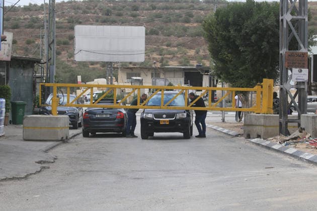 Palestinians Cross Gate Amid West Bank Movement Restrictions Palestinians cross an iron gate west of the West Bank city of Nablus on September 28, 2026, as Israeli restrictions on movement continue for a second day during the Jewish holiday of Sukkot. Israeli forces have closed a number of checkpoints and gates across the West Bank, restricting Palestinian travel between cities, towns and villages and disrupting access to workplaces and services. Photo by Mohammed Nasser apaimages Nablus West Bank Palestinian Territory 280926_Nablus_MN_00(2) Copyright: xapaimagesxMohammedxNasserx xapaimagesx