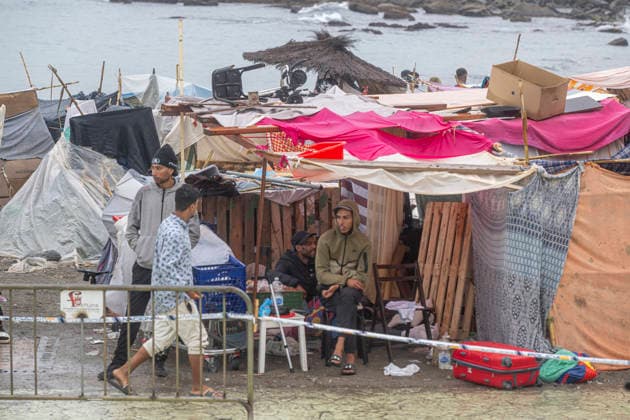 Rain Affects the Settlements on El Trampolín Beach in Ceuta Migrants Remain in the Settlements on El Trampolín Beach Despite the Rain, as of September 28, 2026, in Ceuta, Spain. Around 3,000 migrants remain in makeshift encampments on Ceuta’s beaches following the massive influx recorded in late July. The continuous rain is flooding the ground and damaging the shacks built from reeds, plastic, cardboard, and sheets on Trampolín Beach. SEPTEMBER 28, 2026. Ceuta, Spain Copyright: xMarcosxMorenox 7806269