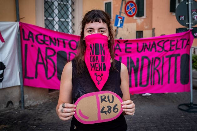 September 28, 2026, Rome, Rm, Italy: To mark International Safe Abortion Day, the feminist and transfeminist movement Non Una Di Meno (Not One Less) is holding a rally outside the Ministry of Health, reiterating their call for The right to free, safe, and accessible abortion for everyone who requests it . A cardboard cutout represents the abortion pill RU-486. Parenthood is a choice, abortion is a right reads the banner. Rome Italy  - ZUMAg256 20260928_znp_g256_014 Copyright: xMarcoxDixGianvitox