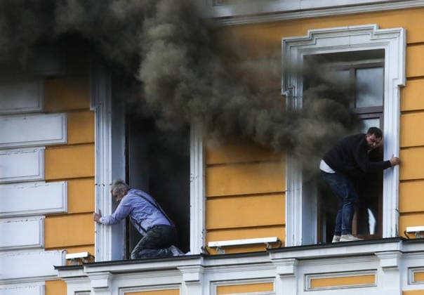 Russian drone strikes Ukrainian National Academy of Sciences building in Kyiv Two men attempt to escape from the National Academy of Sciences building, which is on fire after being hit by a drone, in Kyiv, Ukraine, on September 28, 2026. One person was killed, and three others were injured in the attack. Kyiv Ukraine  Copyright: xVolodymyrxTarasovx originalFilename: ukrinform-russiand260928_npa6T.jpg