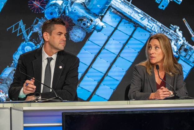 NASA Administrator Jared Isaacman (L) and NASA s Low Earth Orbit Program Manager Dana Weigel discuss an update on the Boeing Starliner Spacecraft at a news conference at Kennedy Space Center, Florida on Monday, September 28, 2026. The backdrop is a photo of the International Space Station, where the Starliner was designed to fly to but has had troubles. After a redesign, the next Starliner is expected to be launched in December.  KSC20260928112 PATxBENIC