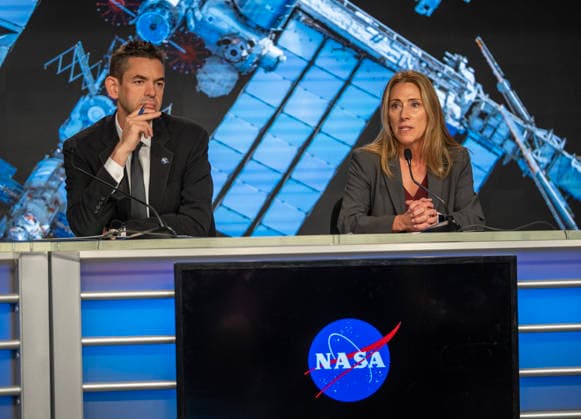 NASA Administrator Jared Isaacman (L) and NASA s Low Earth Orbit Program Manager Dana Weigel discuss and update on the Boeing Starliner Spacecraft at a news conference at Kennedy Space Center, Florida on Monday, September 28, 2026. The backdrop is a photo of the International Space Station, where the Starliner was designed to fly to but has had troubles. After a redesign, the next Starliner is expected to be launched in December.  KSC20260928113 PATxBENIC