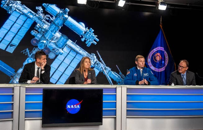 NASA Administrator Jared Isaacman (L), NASA s Low Earth Orbit Program Manager Dana Weigel, NASA astronaut Woody Hoburg, and Boeing Commercial Crew Program Manager John Mulholland (R) make comments at a news conference for an update on the Boeing Starliner Spacecraft at Kennedy Space Center, Florida on Monday, September 28, 2026. The backdrop is a photo of the International Space Station, where the Starliner was designed to fly to but has had troubles. After a redesign, the next Starliner is expected to be launched in December.  KSC202609281081 PATxBENIC