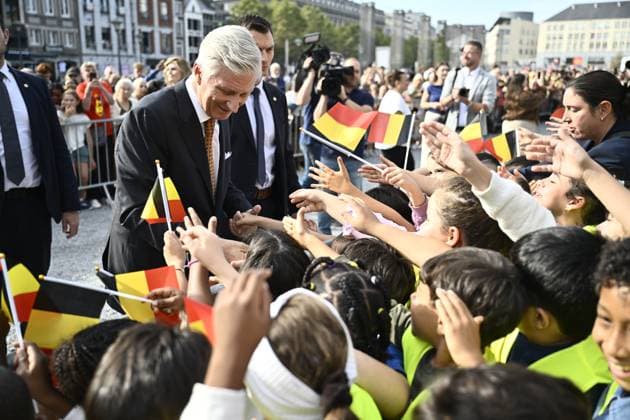 King Philippe - Filip of Belgium pictured during a moment with the local population, on the Place Saint-Lambert, in Liege, Tuesday 29 September 2026, part of a visit to Liege of the Belgian Royals.  ERICxLALMAND 188185345