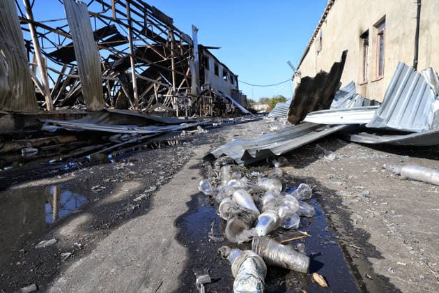 Packs of disposable cups lie on the premises of a civilian industrial facility producing plastic tableware that caught fire due to a nighttime Russian drone strike in the Odesa region, Ukraine, September 29, 2026. (Photo by Nina Liashonok Ukrinform) Manufacturing plant burns down in Odesa region due to Russian drone attack  Copyright: xNinaxLiashonokx