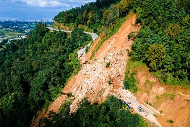 September 29, 2026, Lalitpur, Bagmati, Nepal: LALITPUR, NEPAL, SEPTEMBER 29, 2026: An aerial view shows a landslide blocking the Tikabhairab section of the Kanti Highway in Lalitpur following heavy rainfall. The landslide covered the roadway with mud and debris, disrupting traffic along the route. Lalitpur Nepal - ZUMAq101 20260929_zna_q101_077 Copyright: xAmbirxTolangx