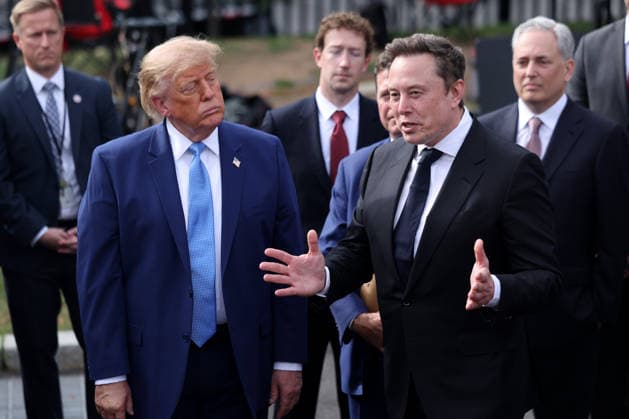 Tesla, X and SpaceX CEO Elon Musk speaks to reporters as President Donald Trump looks on outside the White House on Tuesday, September 29, 2026 in Washington, D.C. Trump held a meeting on super intelligence earlier with tech CEOs in the East Room.  WAX20260929912 TierneyxL.xCross