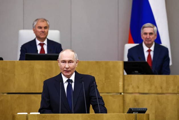 RUSSIA, MOSCOW - SEPTEMBER 30, 2026: Vladimir Putin, President of Russia, addresses the first plenary meeting of the Russian State Duma of the 9th convocation, with Speaker Vyacheslav Volodin (L) and his first deputy Ivan Melnikov in the background. Mikhail Tereshchenko TASS  98570068