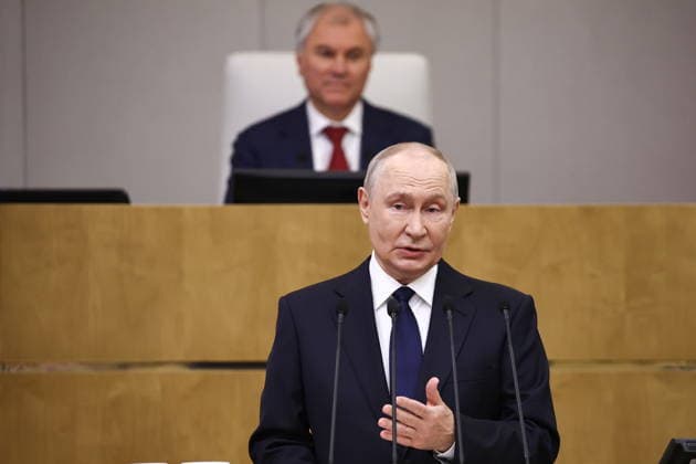 RUSSIA, MOSCOW - SEPTEMBER 30, 2026: Vladimir Putin, President of Russia, addresses the first plenary meeting of the Russian State Duma of the 9th convocation, with Speaker Vyacheslav Volodin in the background. Mikhail Tereshchenko TASS  98570071