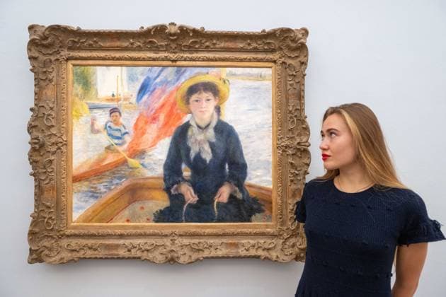 September 30, 2026, London, England, United Kingdom: Pierre-Auguste Renoir En Canot (Jeune fille a la barque), estimated at around USD 25-30 million, is seen with a staff member during a media preview of the Blaquier-Arrieta Collection at Sotheby s in London, Britain, September 30, 2026. The collection of 12 largely unseen Impressionist and Modern works will be offered at auction in New York in November. London United Kingdom  - ZUMAk172 20260930_zip_k172_014 Copyright: xThomasxKrychx