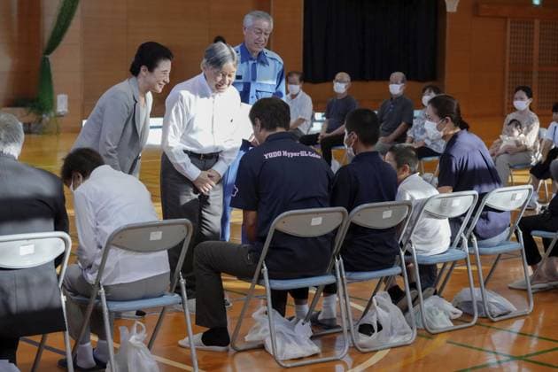 Emperor, empress visit quake-hit Kumamoto Pref. Japan s Emperor Naruhito and Empress Masako talk on Sept. 30, 2026, with people in Hikawa, a Kumamoto Prefecture town devastated by a massive earthquake in late July. (Pool photo)  A14AA0005629472P